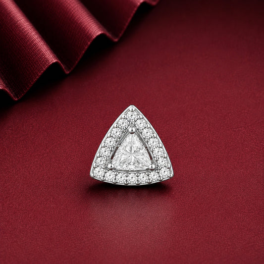 triangular diamond stud with a silver halo setting