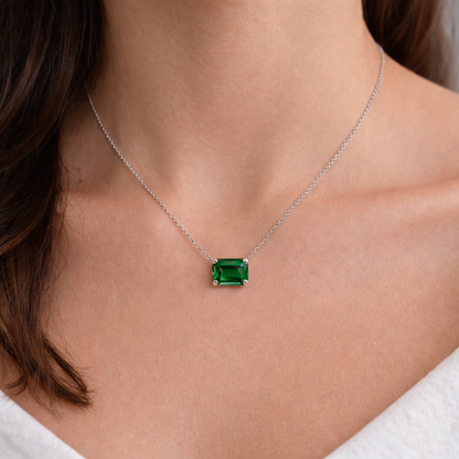 green diamond necklace set on model