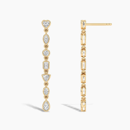 Gold earrings with diamond accents on a white background