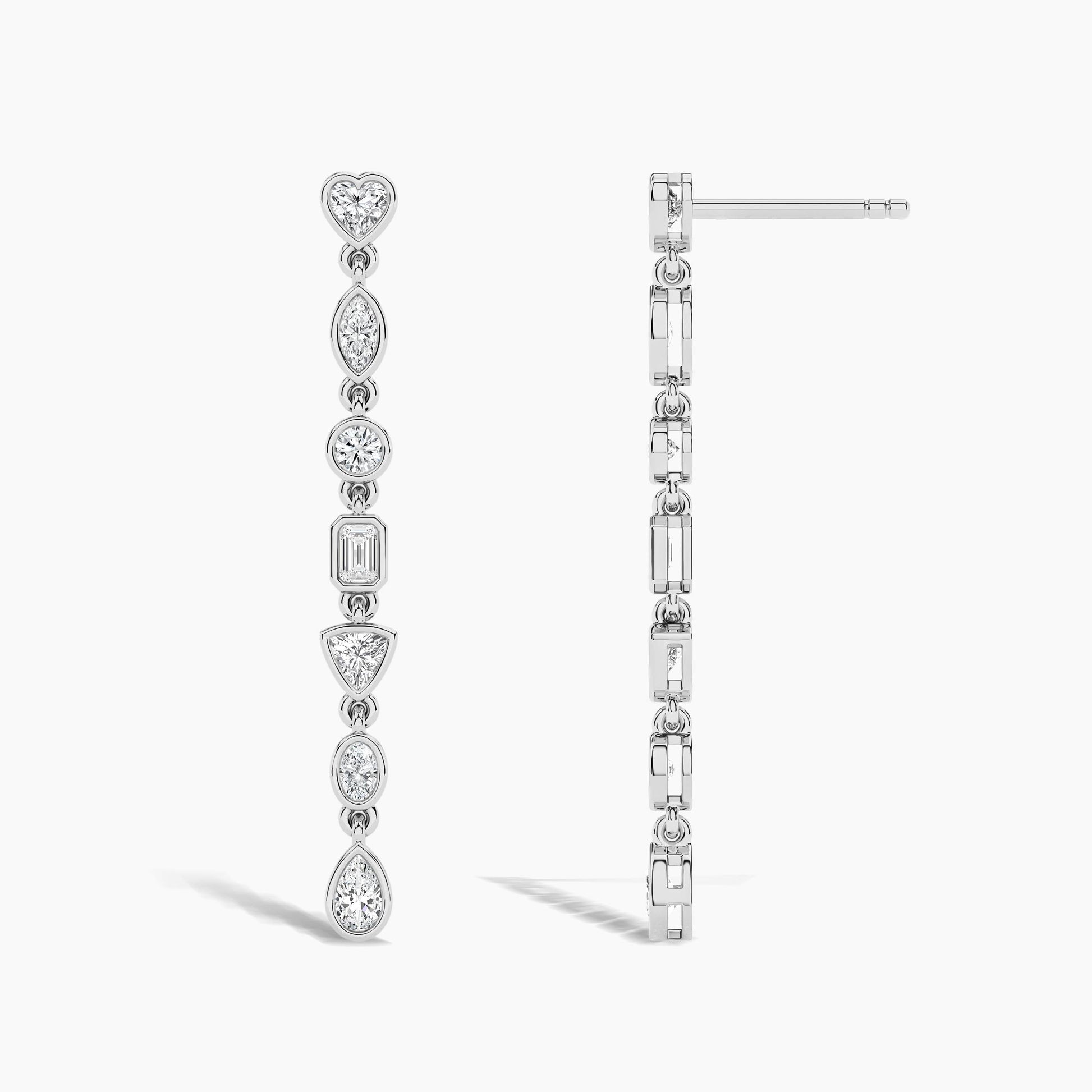 Pair of diamond earrings on a white background