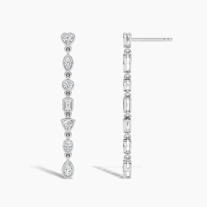 Pair of diamond earrings on a white background