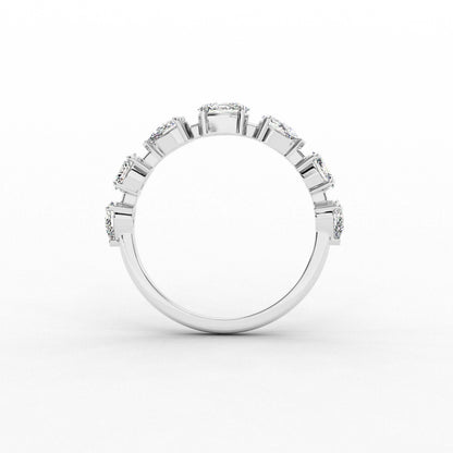 Silver ring with multiple gemstones on a white background