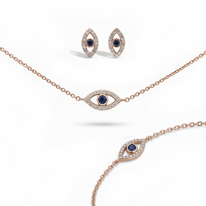 Rose gold necklace, bracelet, and earrings with blue gemstones 