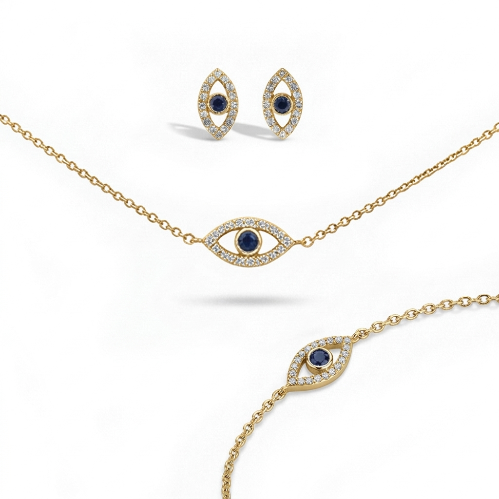 Gold jewelry set with eye-shaped pendants featuring blue stones
