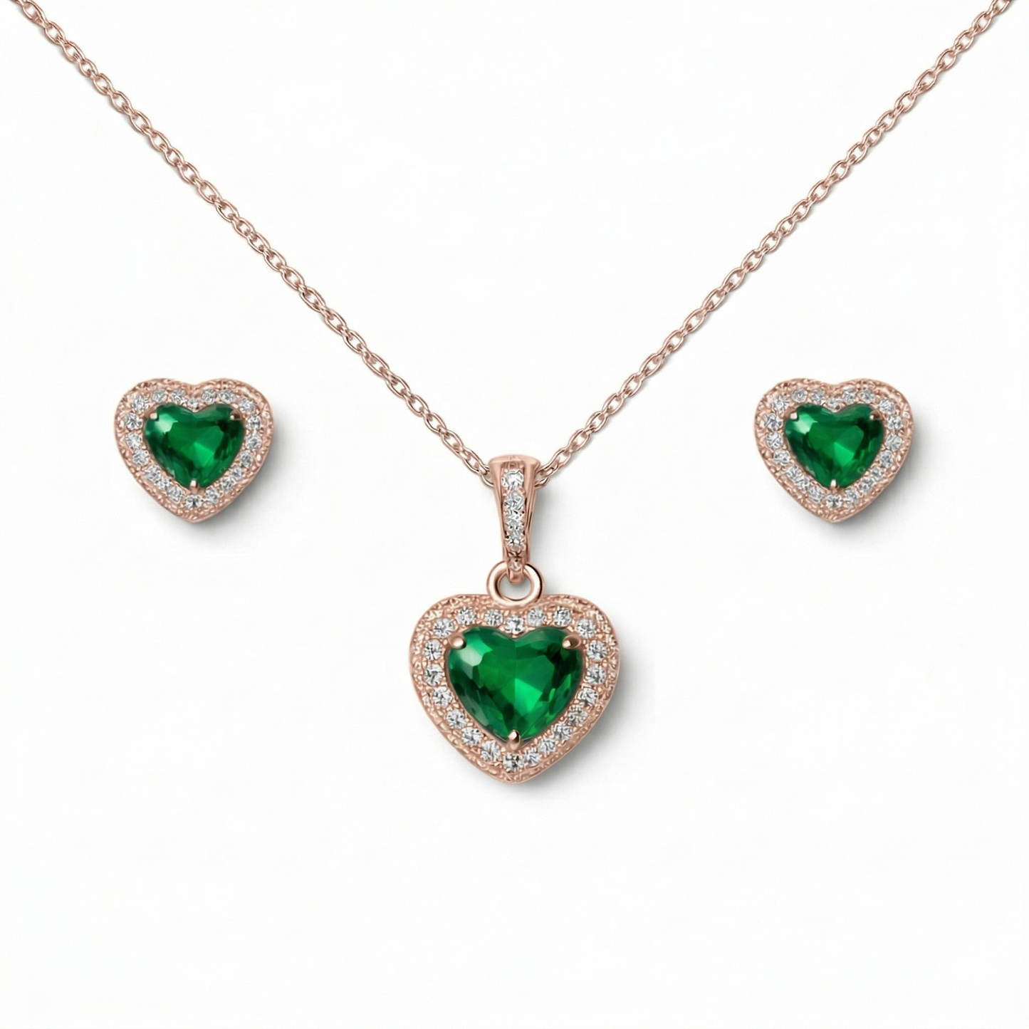Heart-shaped emerald jewelry set with necklace, pendant, and earrings 