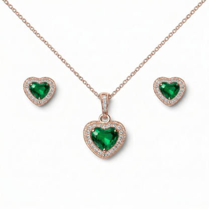 Heart-shaped emerald jewelry set with necklace, pendant, and earrings 