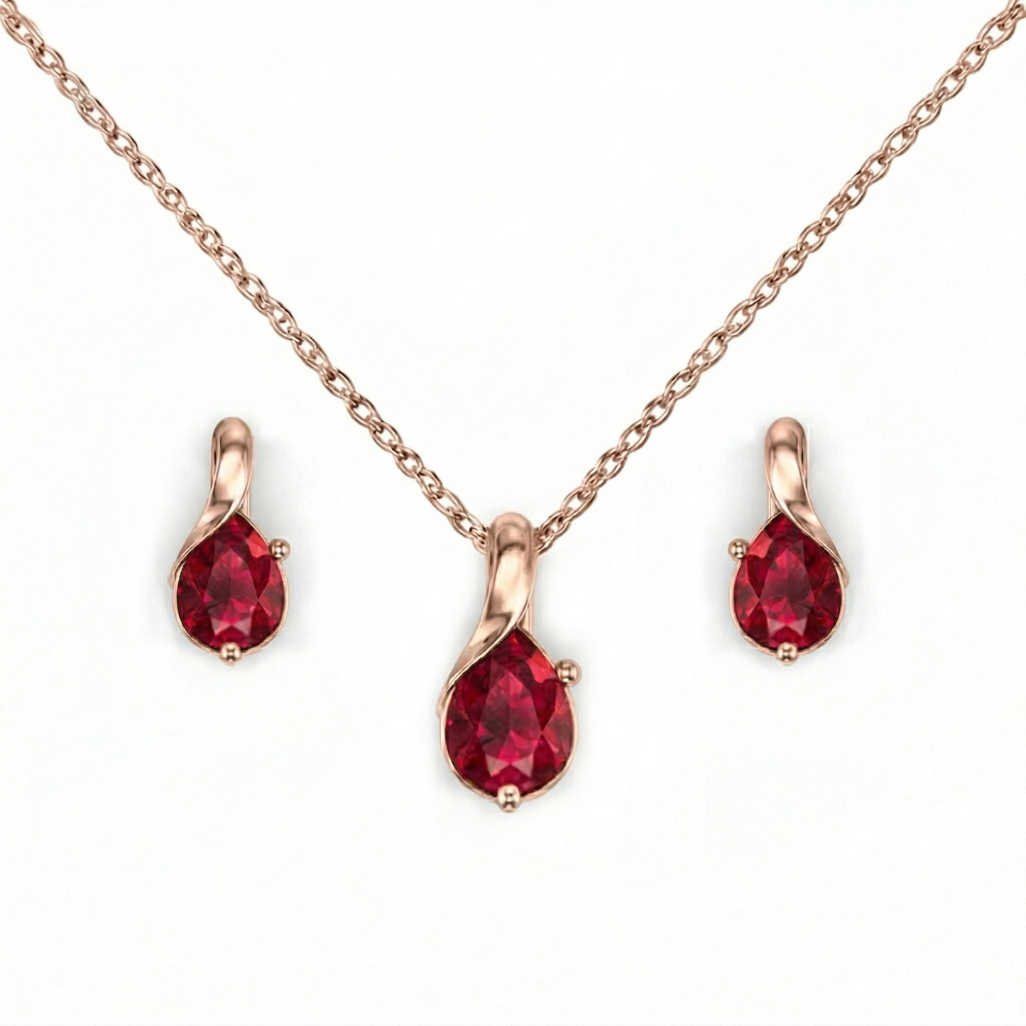 Jewelry set with red gemstones and rose gold