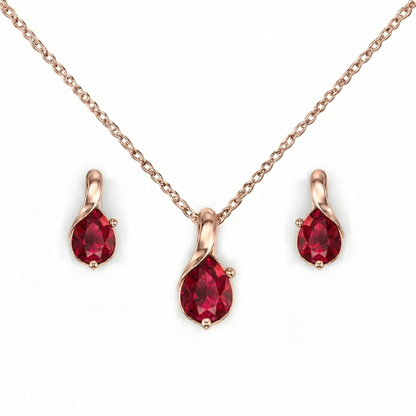 Jewelry set with red gemstones and rose gold