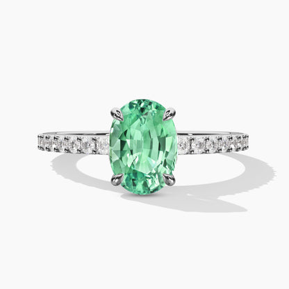 Green oval diamond ring in silver