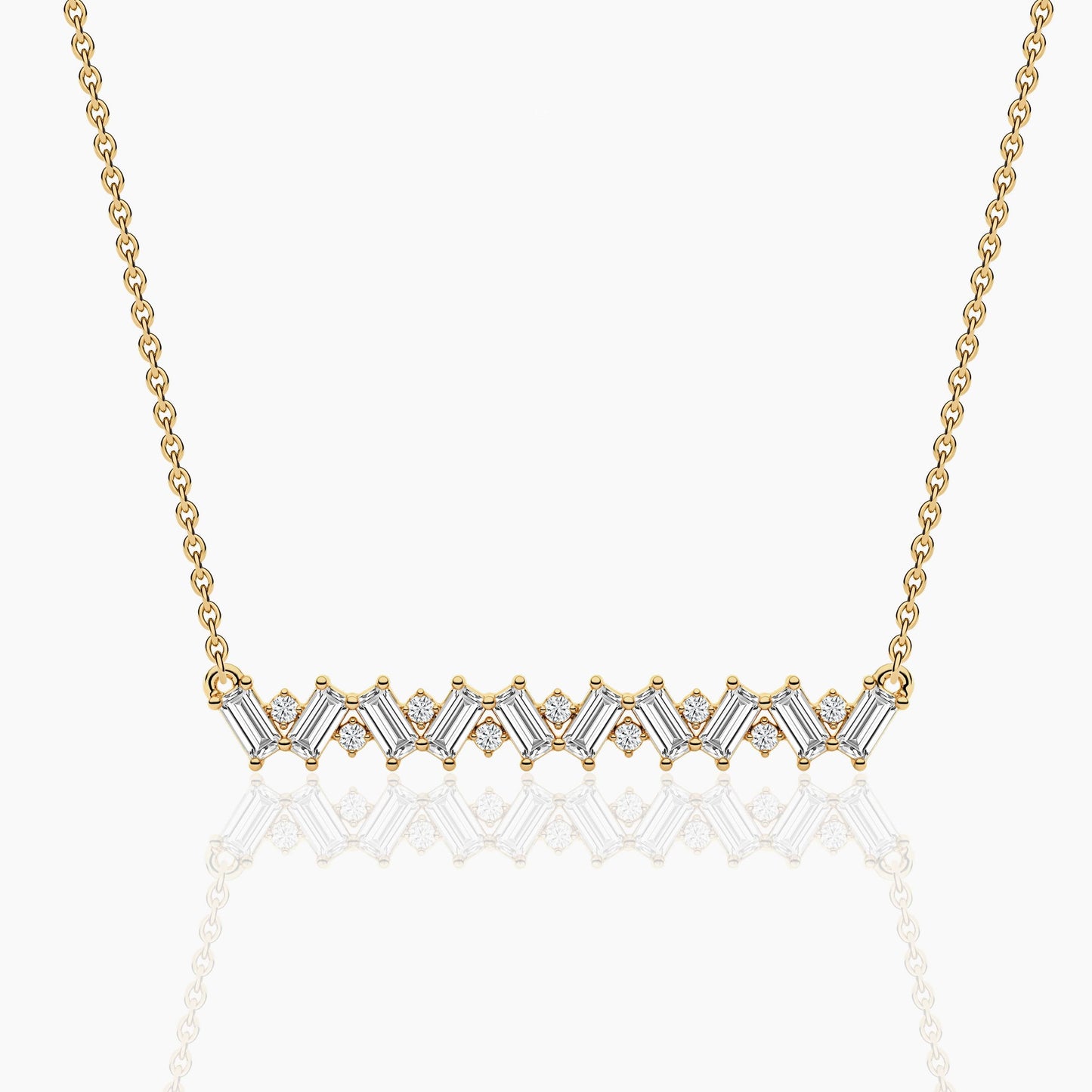 Gold necklace with diamond accents on a white background