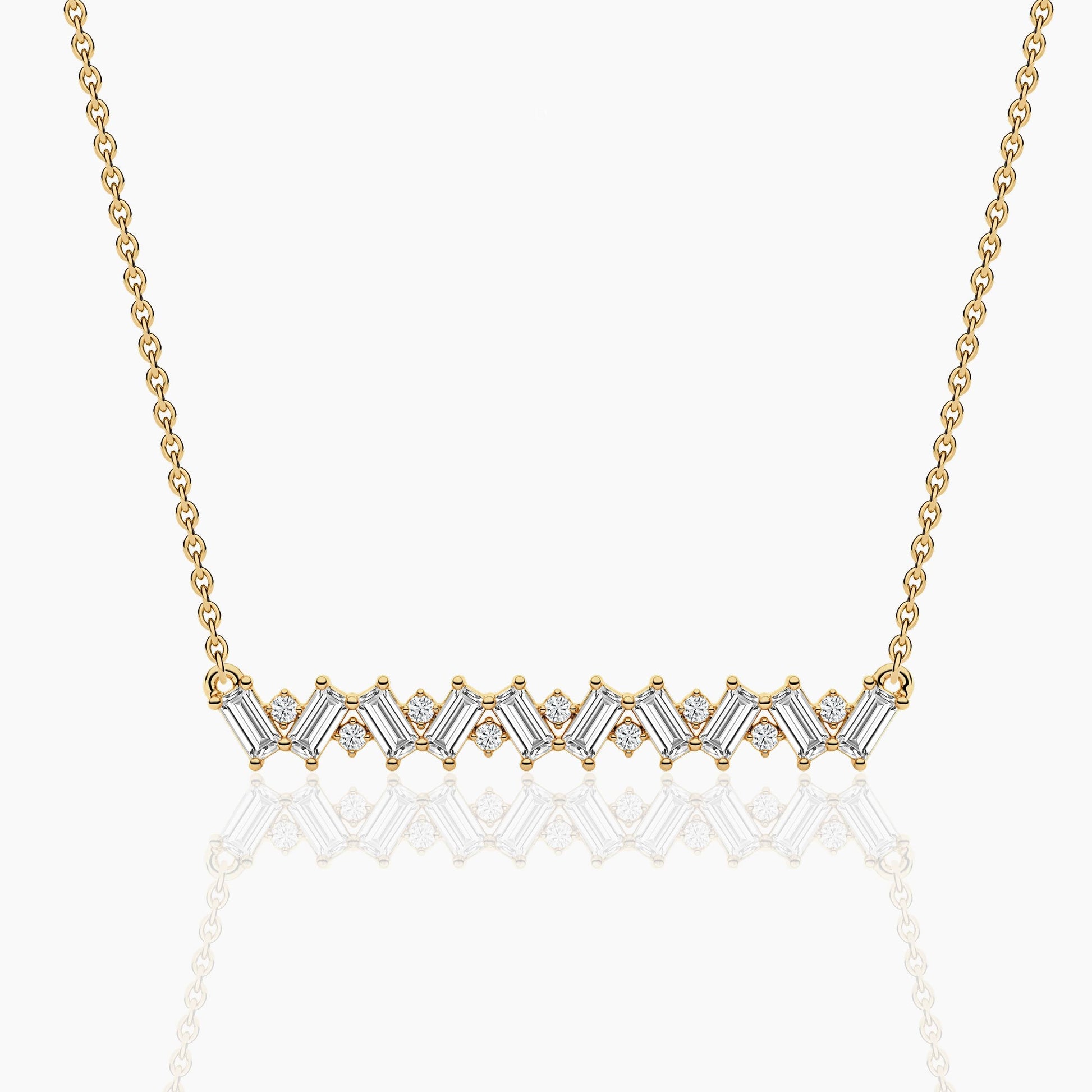 Gold necklace with diamond accents on a white background