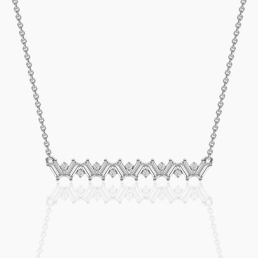 Silver necklace with a delicate chain on a white background