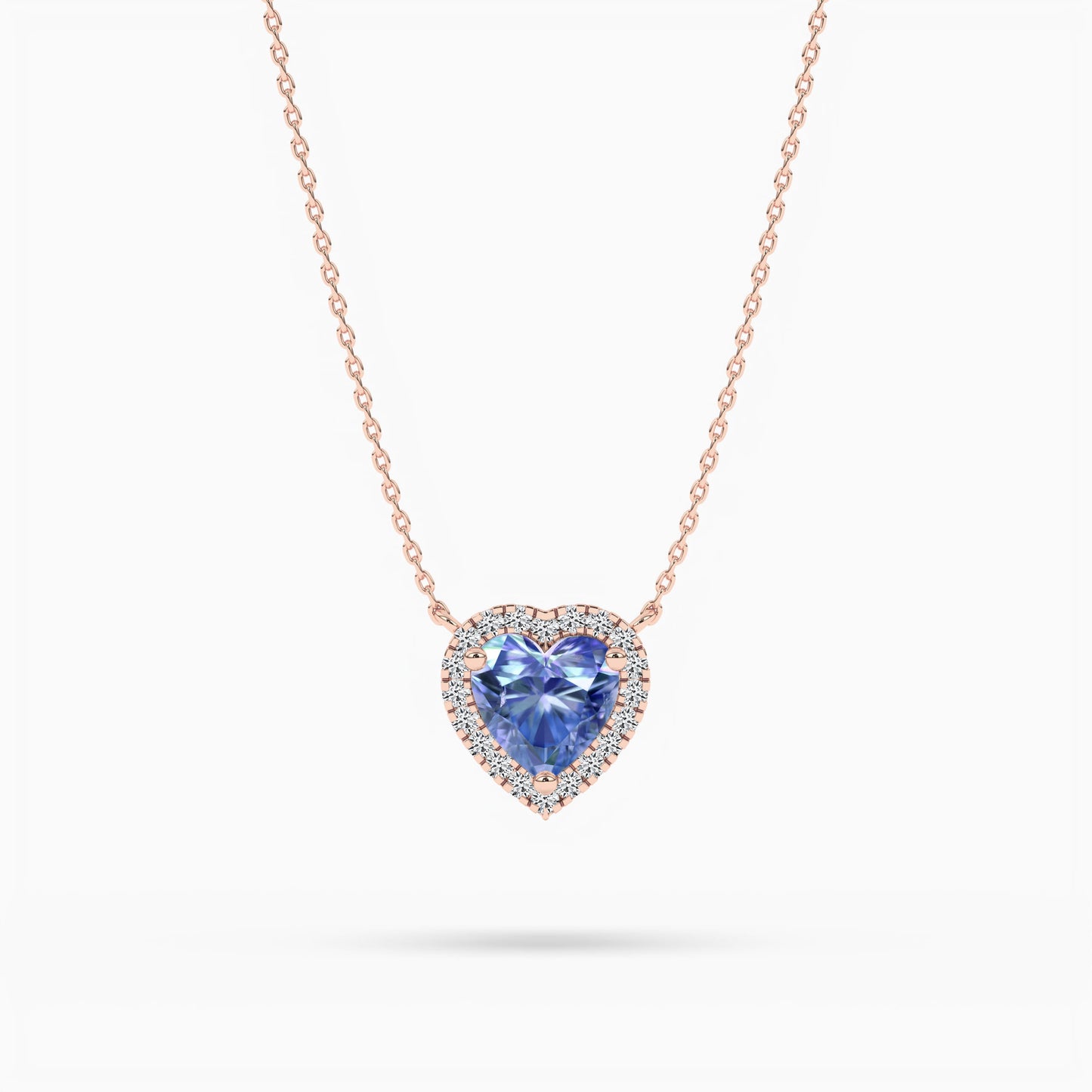 rose gold heart-shaped pendant in silver