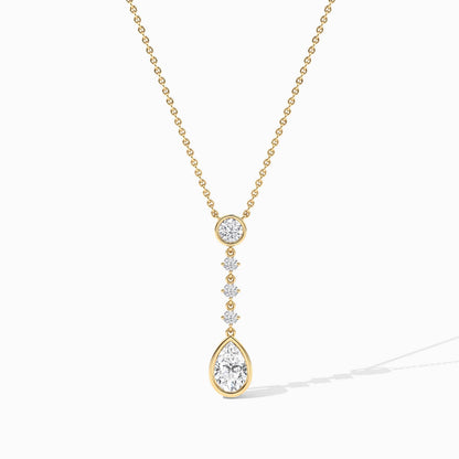 Gold necklace with a teardrop-shaped pendant on a white background