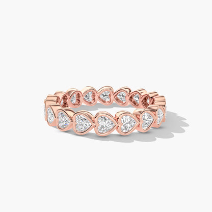 Rose gold ring with heart-shaped gemstones