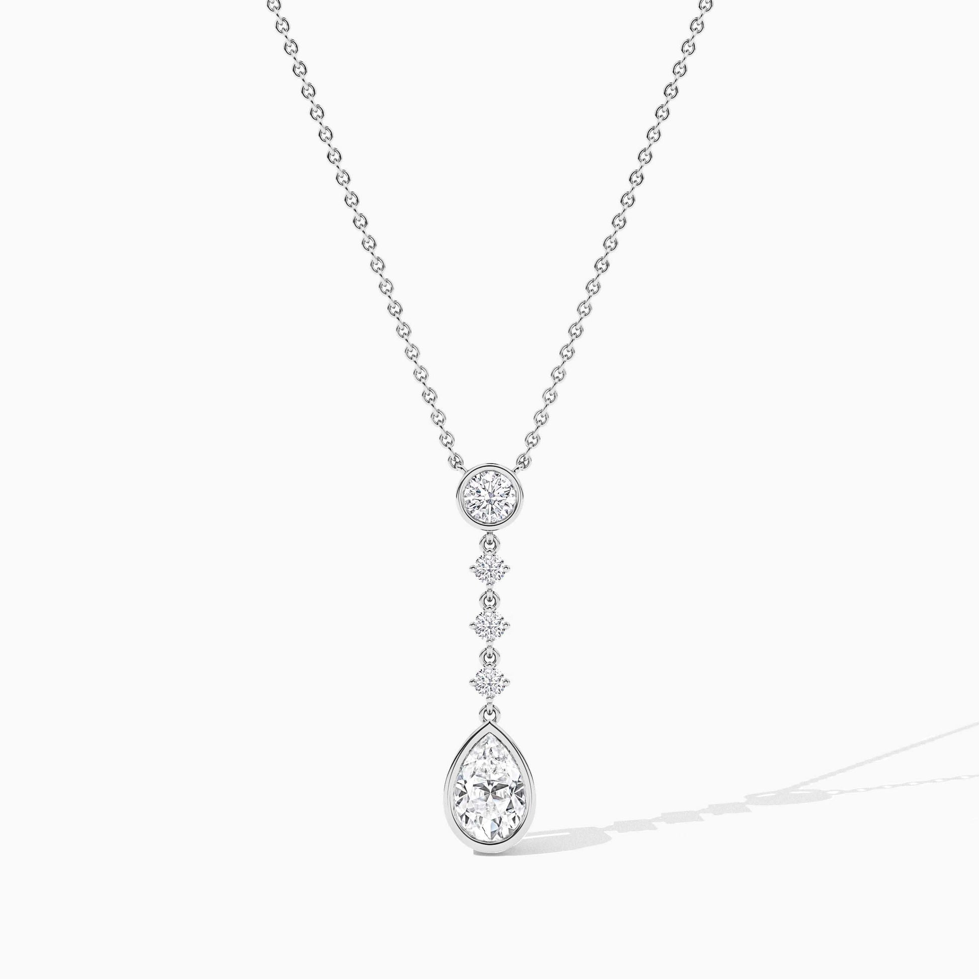 Diamond necklace with a teardrop pendant on a white background