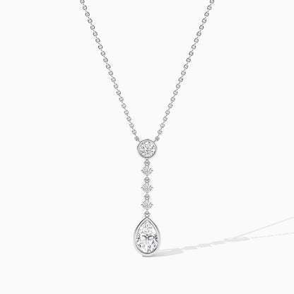 Diamond necklace with a teardrop pendant on a white background