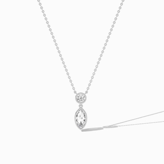 Silver necklace with a teardrop-shaped pendant on a white background