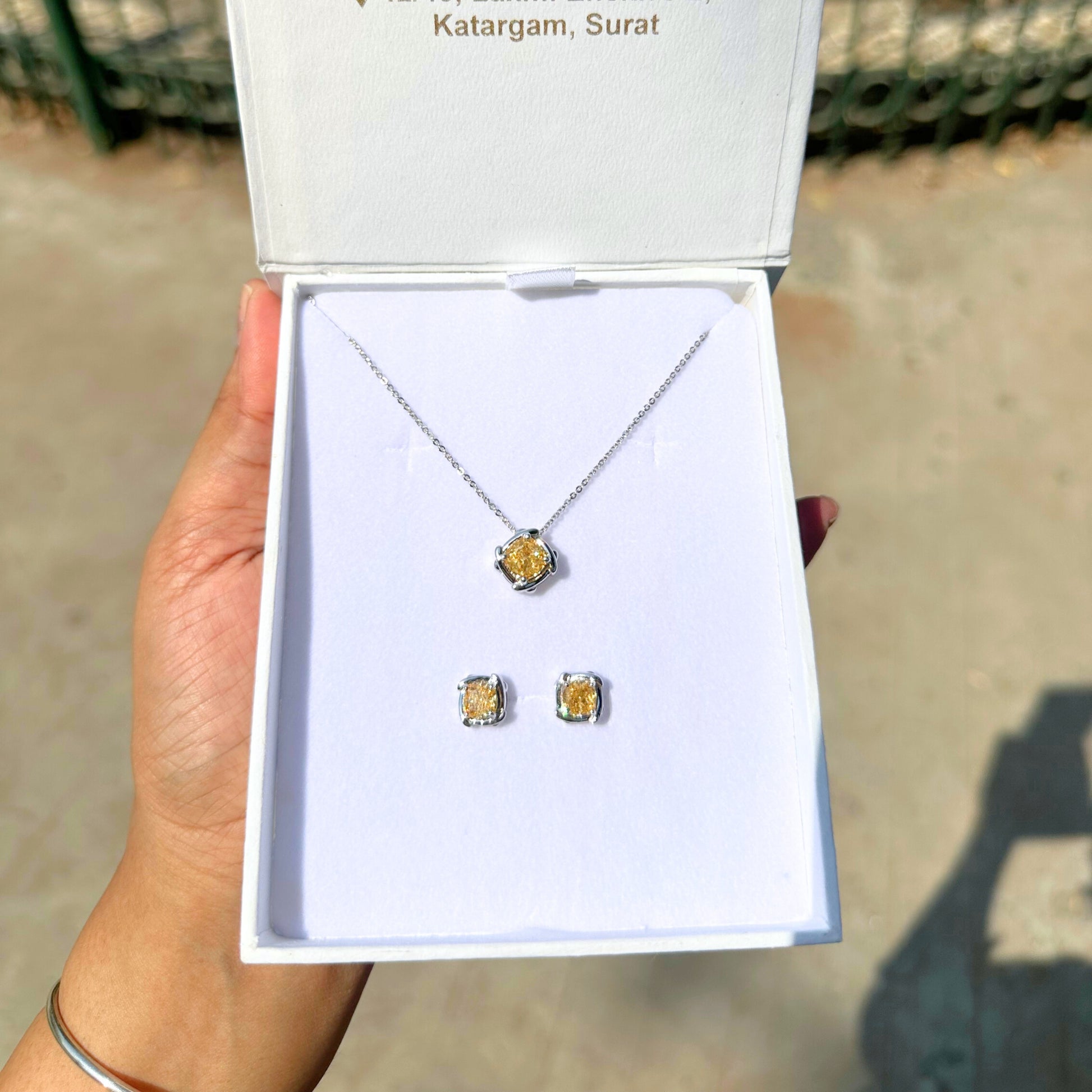 Yellow diamond pendant