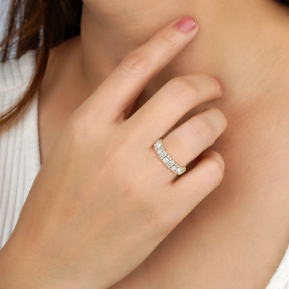 Close-up of a hand wearing a diamond ring 