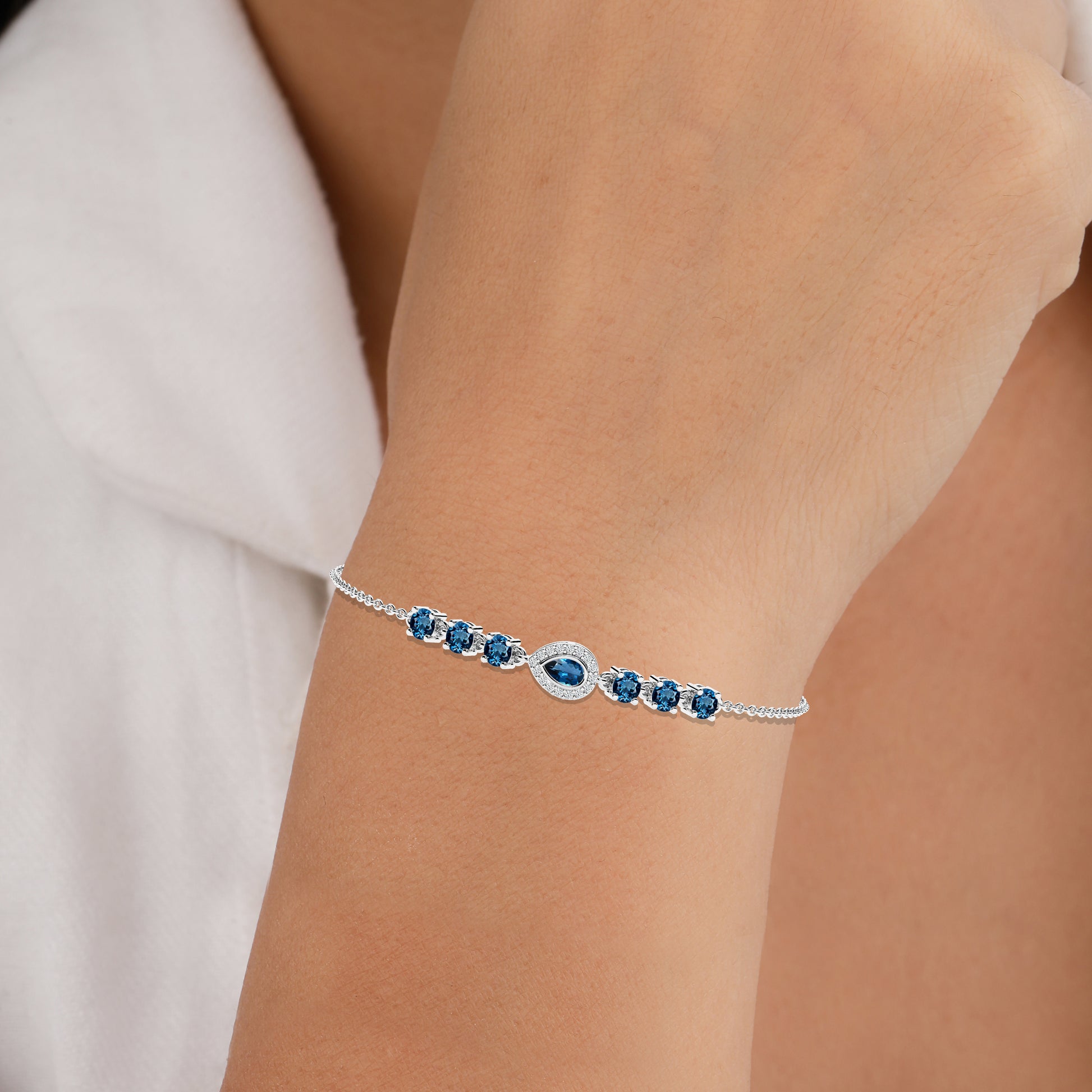 silver bracelet with blue stone