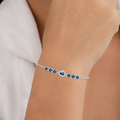 silver bracelet with blue stone