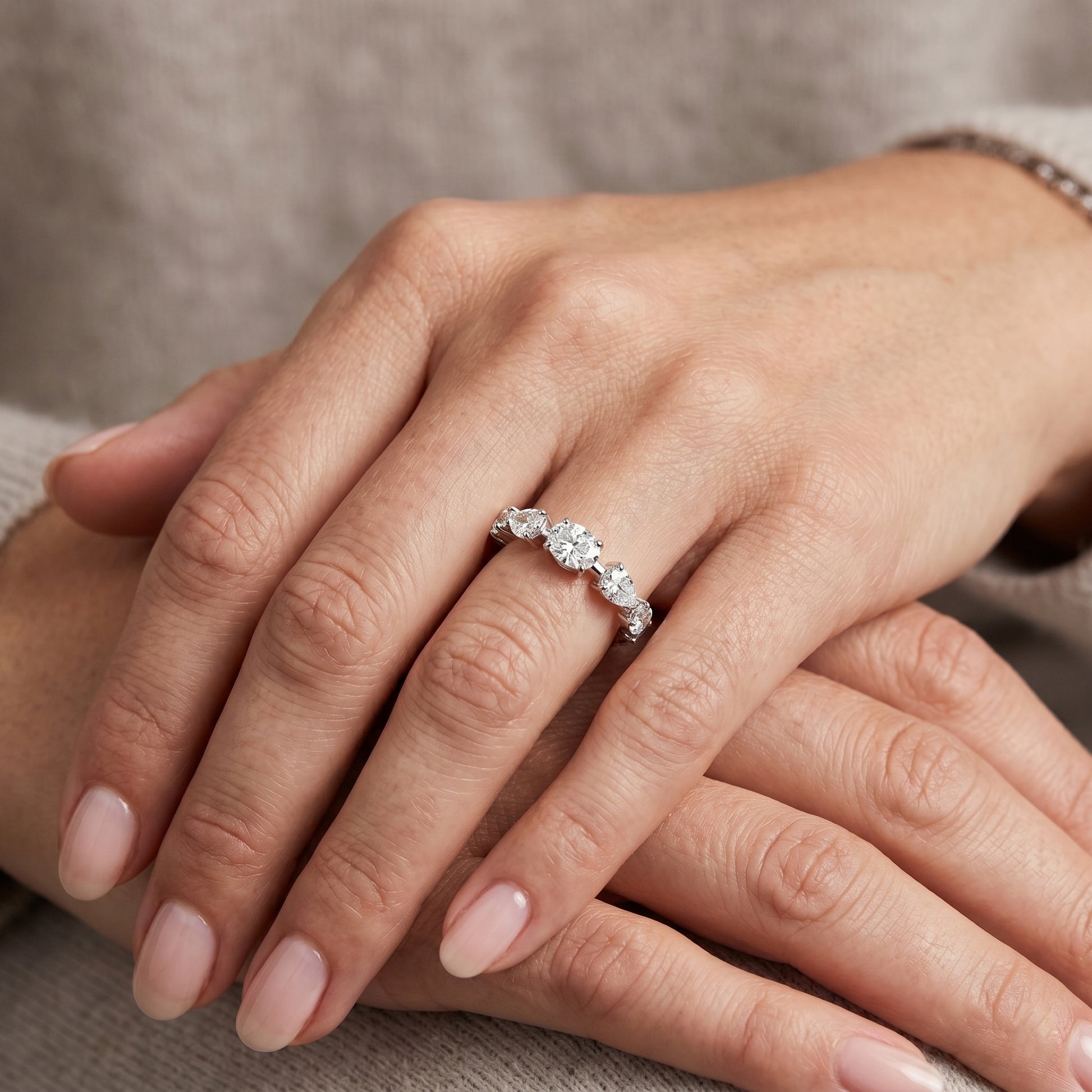 Close-up of a hand wearing a diamond ring