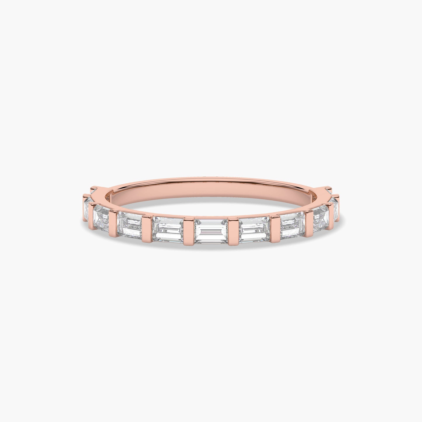 Rose gold ring with baguette cut diamonds