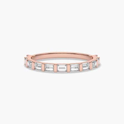 Rose gold ring with baguette cut diamonds