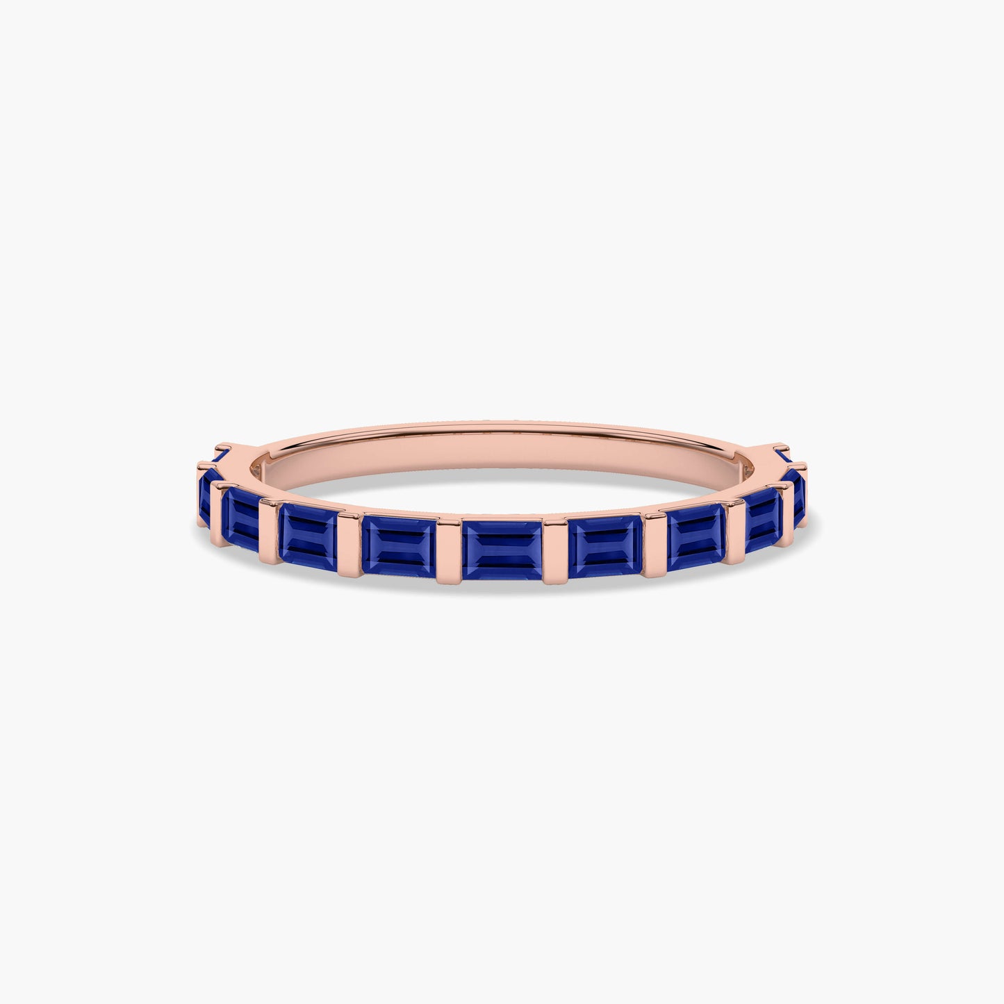Rose gold plated ring with blue gemstones 