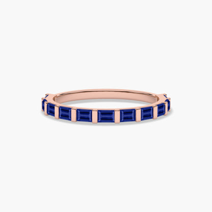 Rose gold plated ring with blue gemstones 
