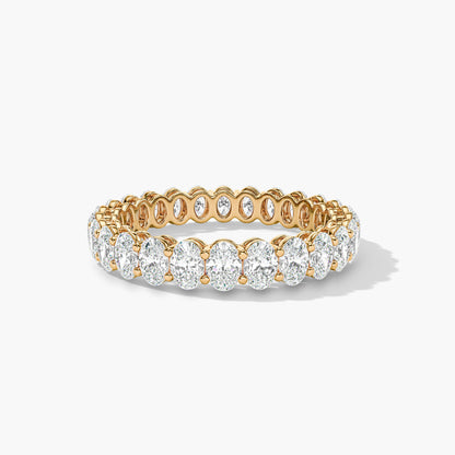 Gold and diamond ring on a white background