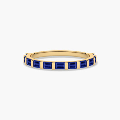 Gold plated ring with blue gemstones