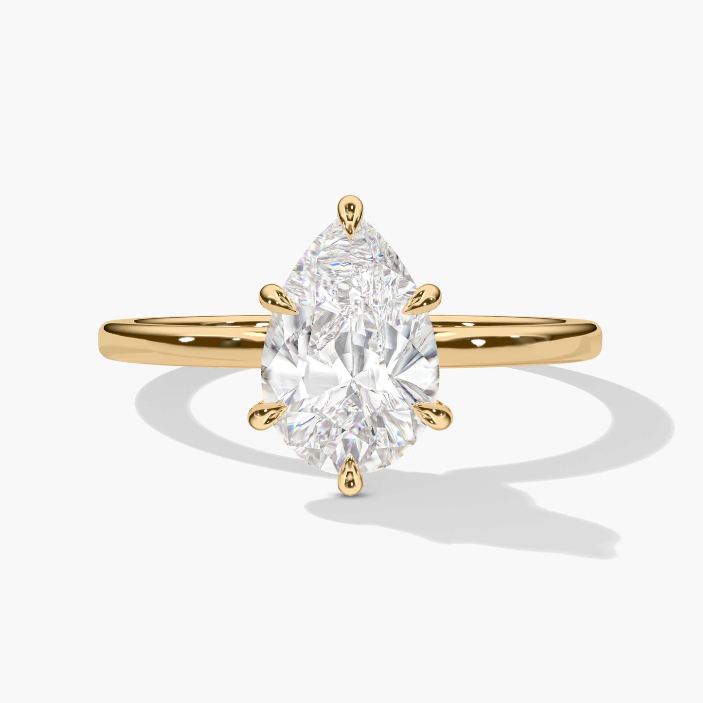yellow gold-plated pear-cut diamond engagement ring