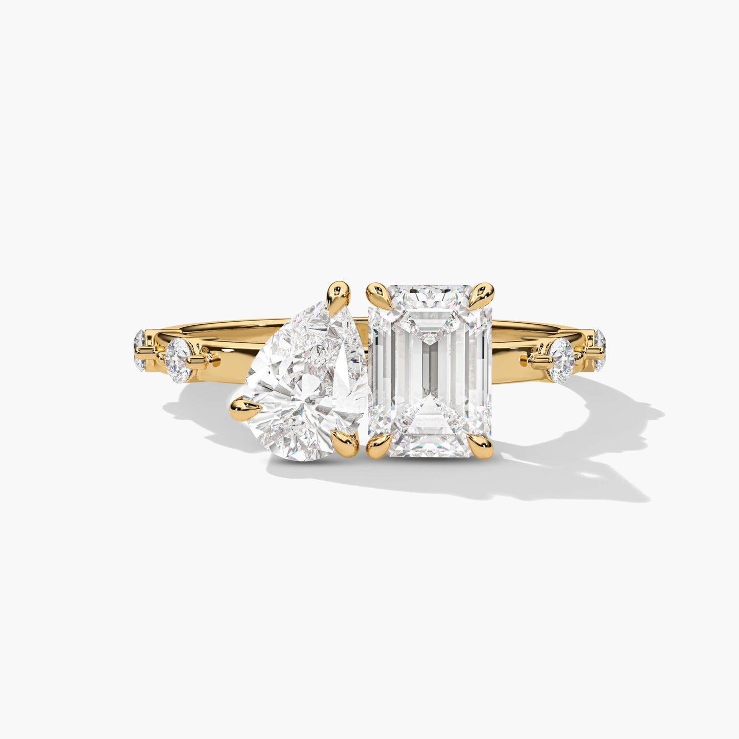 Gold ring with two emerald-cut diamonds 