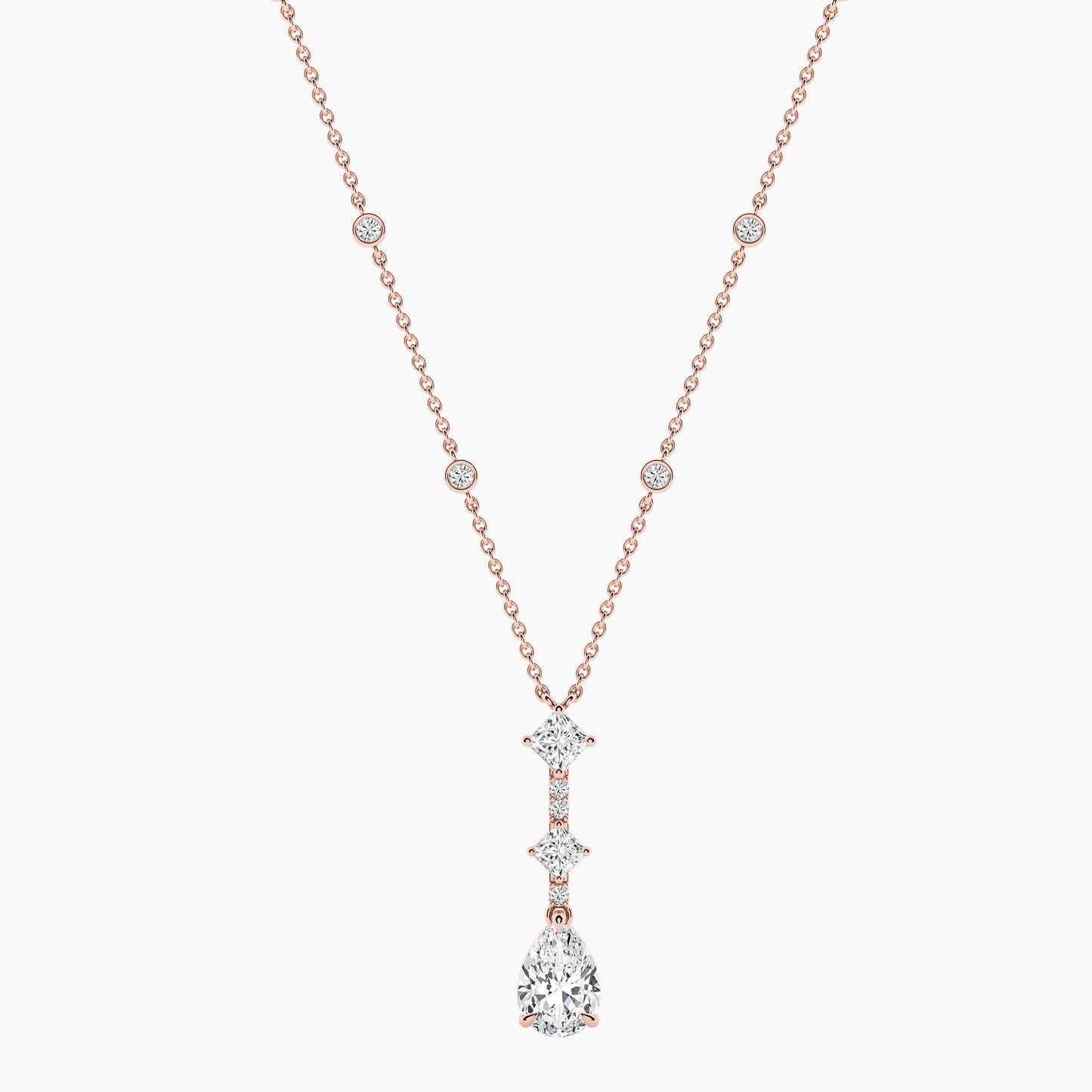 Rose gold necklace with a diamond pendant on a white background