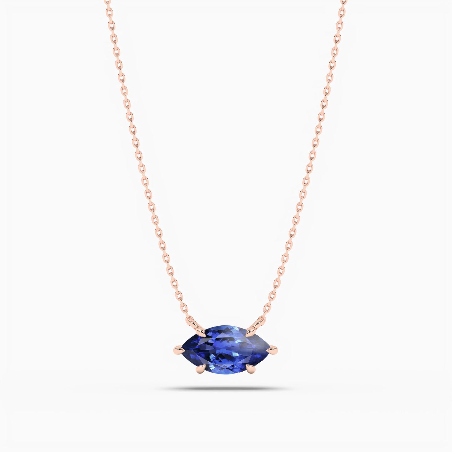 blue-colored diamond necklace in silver