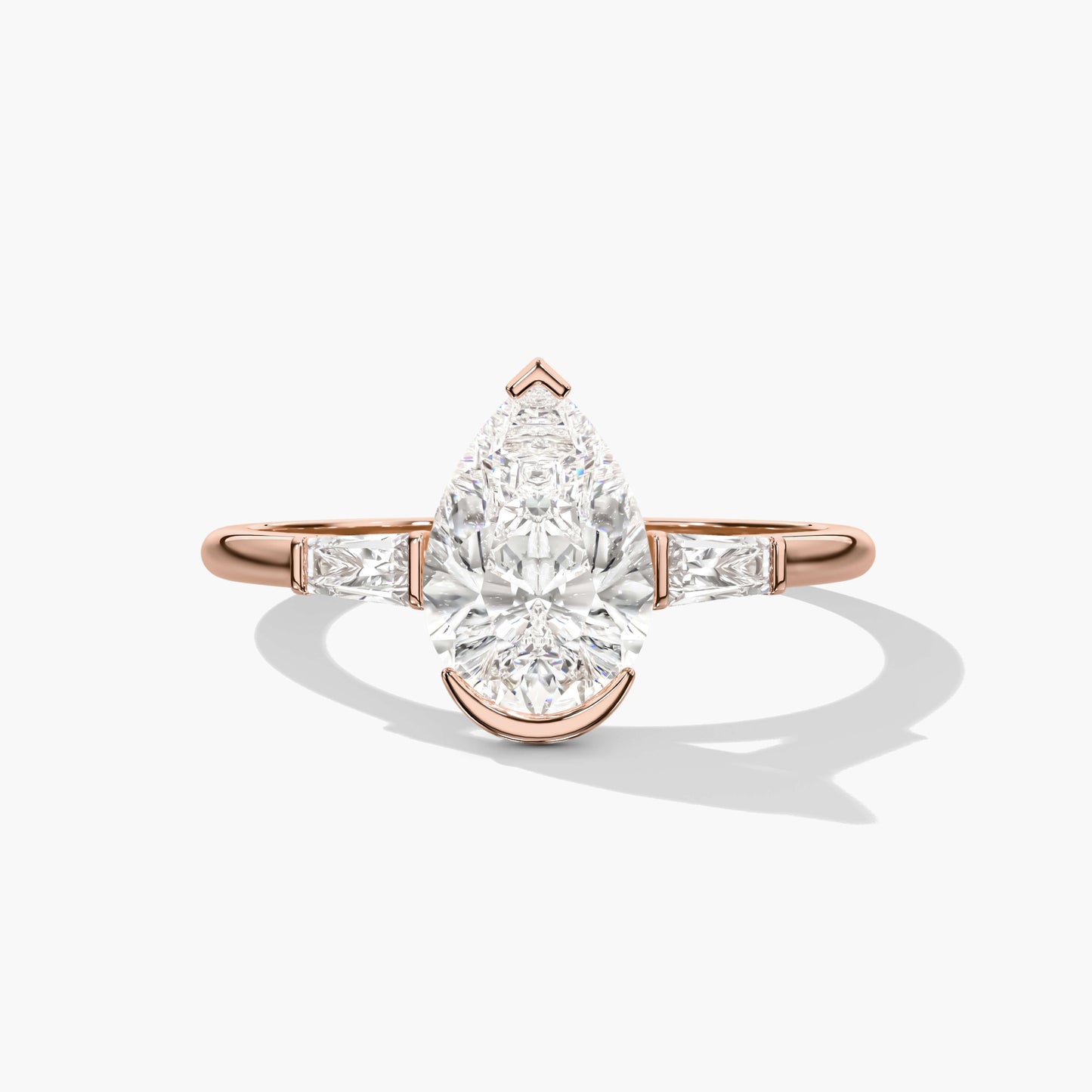 Rose gold ring with a pear-shaped diamond