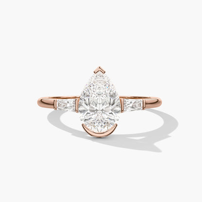 Rose gold ring with a pear-shaped diamond