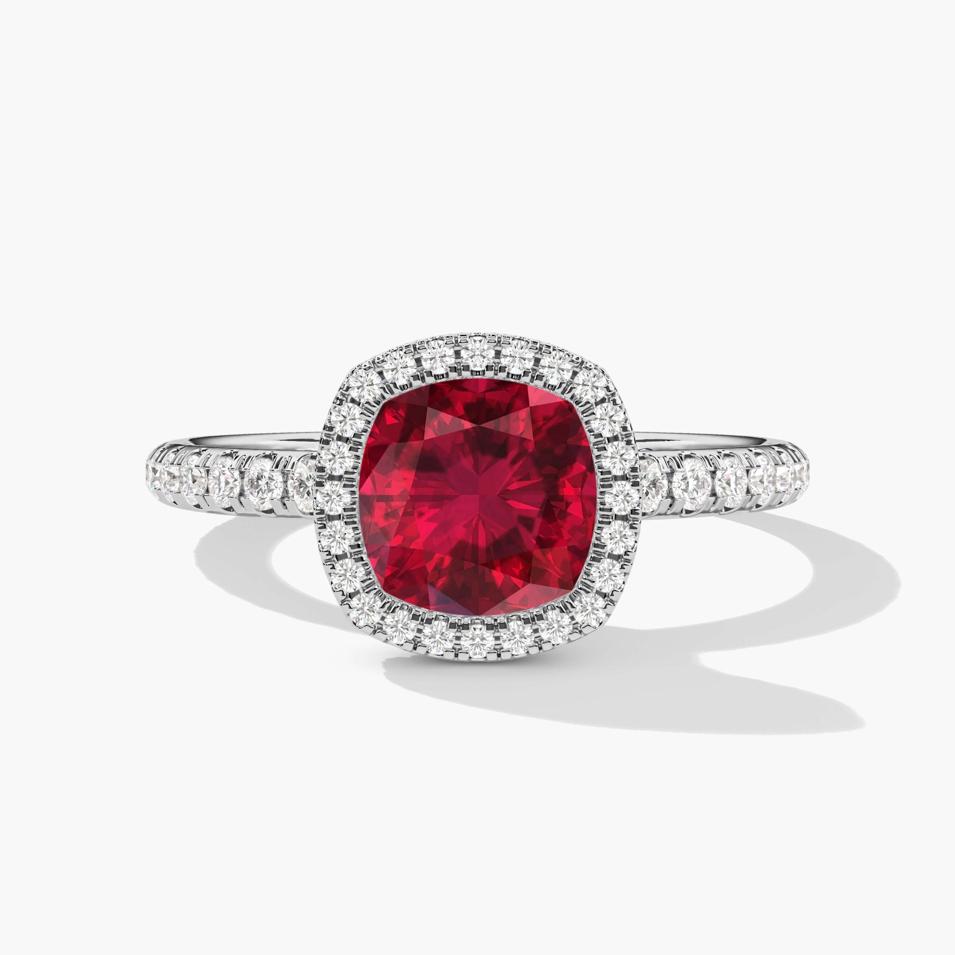 Red ruby halo diamond ring